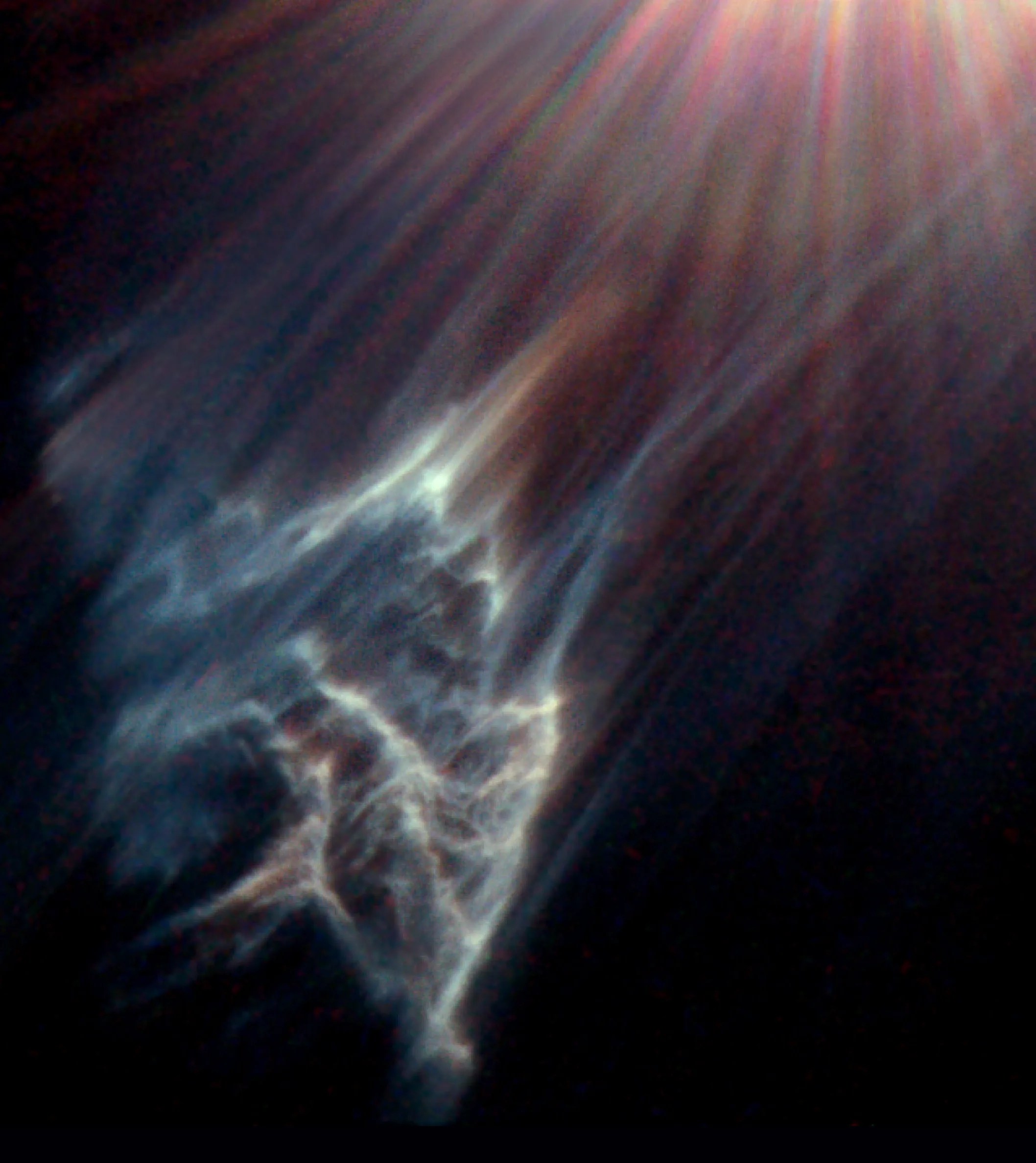 A bright star and reflection nebula in the Pleiades